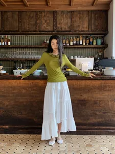 Elegant white tiered asymmetrical long skirt with elastic waist for spring and summer