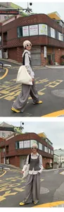 Stylish loose wide-leg casual pants for women in grey shown in a street fashion outfit