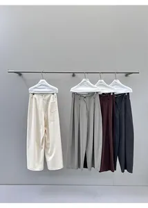 Detailed view of women's wide-leg denim trousers in four classic autumn and winter colors