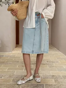 Stylish light blue straight knee-length denim skirt for women perfect for summer fashion