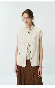 Detailed view of women's brown textured pleated skirt with bias-cut stitching detail.