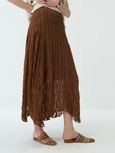 Elegant brown crinkled pleated midi skirt with bias-cut design for beach vacations