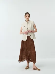 Elegant pleated asymmetric midi skirt in earthy brown for a sophisticated summer style