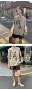 Stijlvolle glanzende donkerbruine leren shorts voor dames met een gestreepte mesh-top