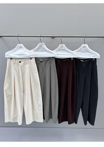 Detail shot of women's casual wide-leg floor-length trousers in four autumn colors