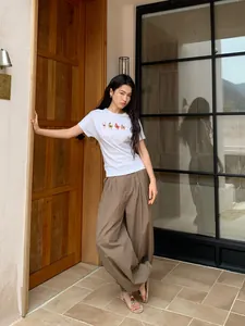 Casual retro checkered loose-fit wide-leg pants with elastic waist and cuffed hem