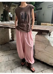 Full length view of breathable pink Lyocell Tencel lantern wide leg pants on model