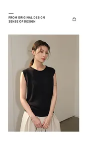 Detail view of a black sleeveless linen blend knit top featuring a minimalist design