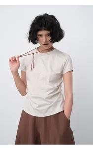Slim fit women's short sleeve T-shirt featuring pleated waist design in light beige