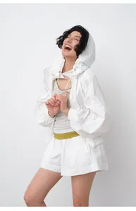 Lightweight white hooded sun protection jacket and shorts set for women summer outdoor.