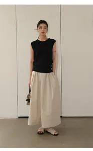 Detail view of a black sleeveless linen blend knit top for women's spring fashion