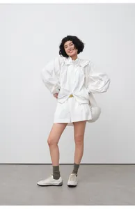 Full view of women's lightweight white hooded sun protection jacket with shorts.