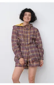 Full body detail view of a plaid hooded shirt jacket and matching shorts on model