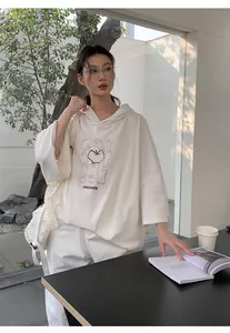 Korean style oversized white hooded sweatshirt with INNOVATE graphic print