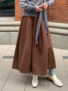 Jupe-culotte marron évasée coupe courte 9/10 pour une silhouette amincie élégante