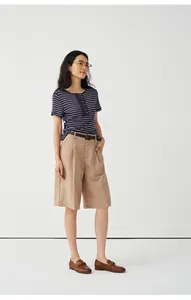 Style view of Asian woman in navy striped Tencel linen T-shirt and khaki shorts set