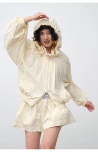 Lightweight loose hooded sun protection jacket and shorts set in pale yellow for women