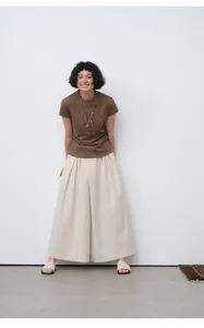 Korean style brown short sleeve T-shirt with beige wide-leg pleated trousers for women