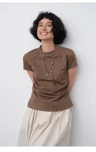 Slim fit brown T-shirt for women with waist pleats and decorative necklace detail.