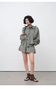 Lightweight loose green hooded sun protection jacket with matching shorts for summer