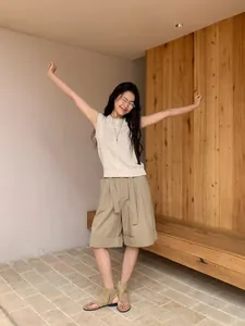 Elegant minimalist sleeveless linen-blend knit top in beige oatmeal for spring fashion