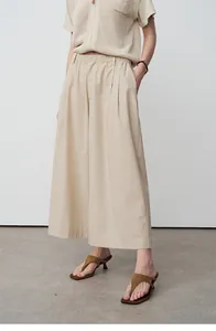 Beige relaxed-fit wijde korte broek met elastische taille en geplooide voorkant