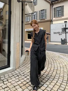 Ensemble gilet sans manches noir décontracté avec double zip et pantalon large