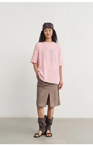 Loose pink knit top with round neck and silver jacquard pattern, stylish autumn outfit