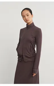 Detailed studio view of women's brown modal knit sports jacket and straight casual skirt