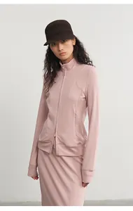 Professional studio shot of women's modal knit pink zip jacket and long skirt set