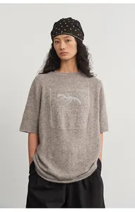 Relaxed fit grey woolly knit top featuring silver thread jacquard animal motif and half sleeves