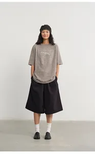 Loose-fit grey crew neck knit top with silver jacquard animal detail for women