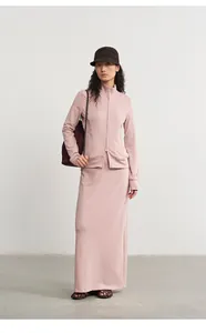 Asian model wearing a mauve Modal knit zip jacket and straight long skirt casual set