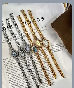 Detailansicht der GEDI Vintage-Quarzuhren für Damen mit ovalem Diamant-Stahlband