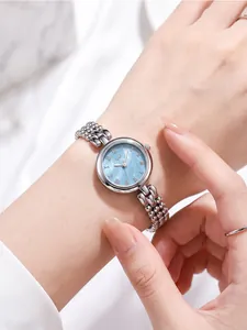 Elegant silver beaded chain watch with light blue dial for women, perfect for office