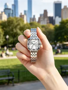 Close-up of GEDI silver square dial ladies watch with faceted glass and metal strap