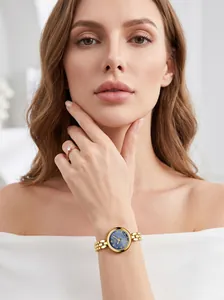 Elegant Gedi gold women's watch with deep blue dial and multi-row bead chain strap