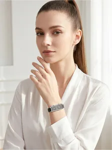 Professional lifestyle view of a retro French double-dial rectangular watch with black strap