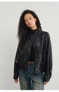 Chaqueta vintage de cuero sintético negro con cierre de botones diagonal mujer