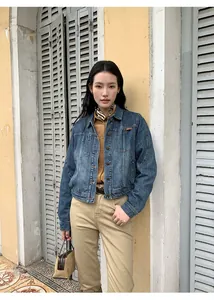 Stylish American style gradient wash short denim jacket for women, casual autumn outfit.