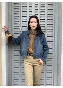 American style lapel gradient wash denim short jacket shown in a retro lifestyle setting