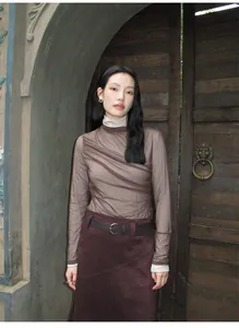Vintage Maillard style burgundy suede asymmetrical A-line skirt shown on model