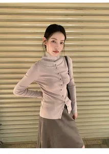 Elegant retro brown A-line skirt paired with a mauve knitted cardigan for autumn