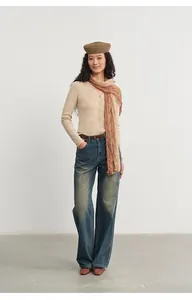 Slim-fit beige knitted cardigan for women paired with a matching long brown scarf