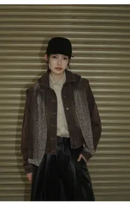 Stylish brown washed denim jacket for women featuring an American lapel and short cut design.