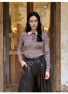Full view of high waist black PU leather wide leg pants and textured polo knit