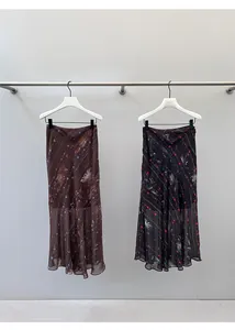 Vintage bias-cut floral print midi skirts available in chocolate and black colors
