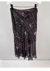 Vintage floral print bias-cut midi skirt featuring a flowy and elegant fishtail hemline