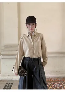 Stylish women's high-waisted black soft PU leather wide-leg culottes pants for fall.