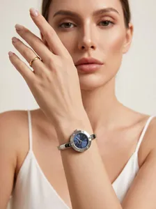Close-up of Gedi elegant bangle watch featuring a blue dial and crystal accents.